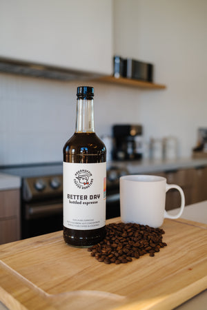 On the counter a bottle of Better Day Bottled Espresso from Ragamuffin Coffee