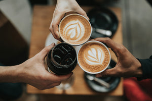 3 cups of coffee from top down perspective above a table